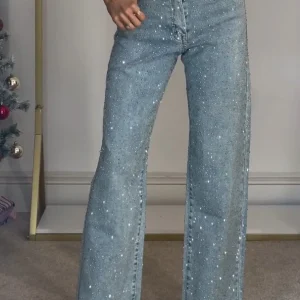 Jean glamour taille haute à jambes larges et brillance subtile