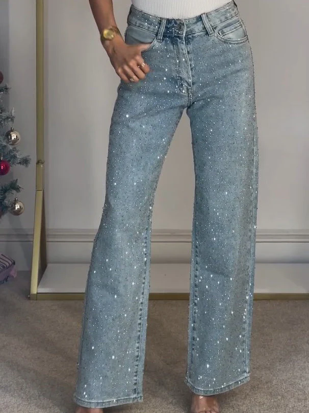 Jean glamour taille haute à jambes larges et brillance subtile