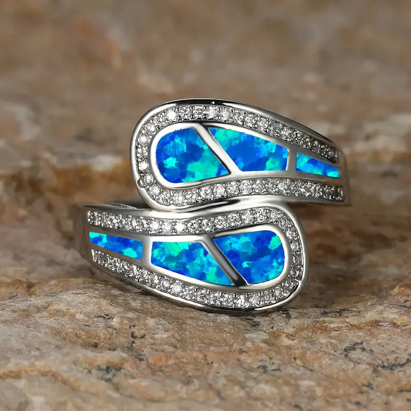 Bague ouverte en argent avec opale bleue – Image 2